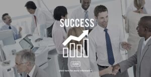 Success symbol with young professionals for tax credits.