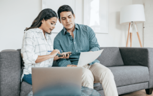 A girl is discussing tax planning with a boy.
